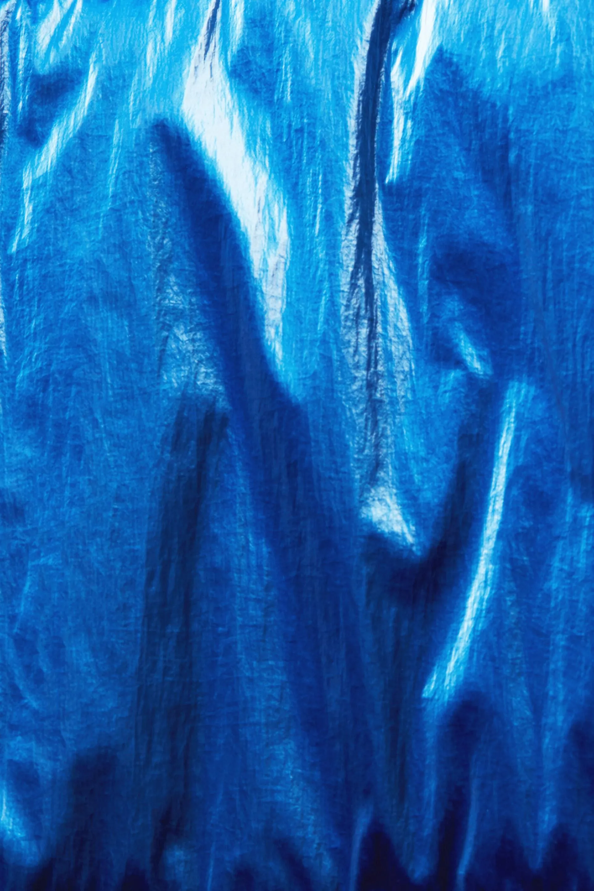 Cappotto lungo in piumino reversibile