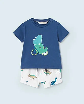 Completo blu e bianco con fantasia dinosauri composto da t-shirt a mezza manica e bermuda abbinati 6-12 mesi