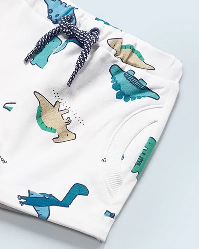 Completo blu e bianco con fantasia dinosauri composto da t-shirt a mezza manica e bermuda abbinati 6-12 mesi