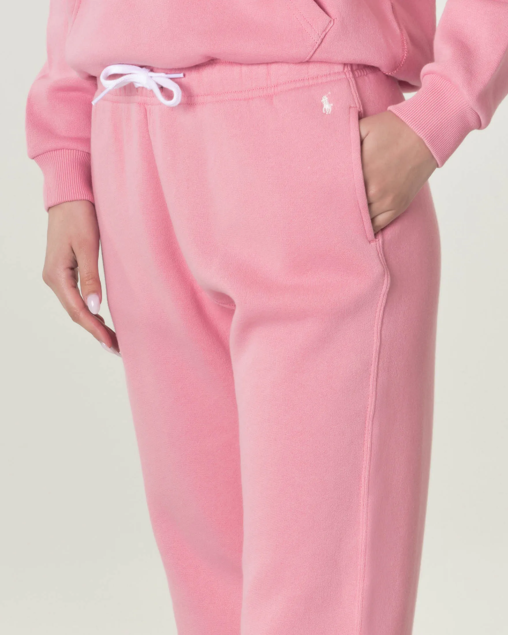 Pantaloni rosa in felpa di cotone con elastico inserito nei polsini e in vita