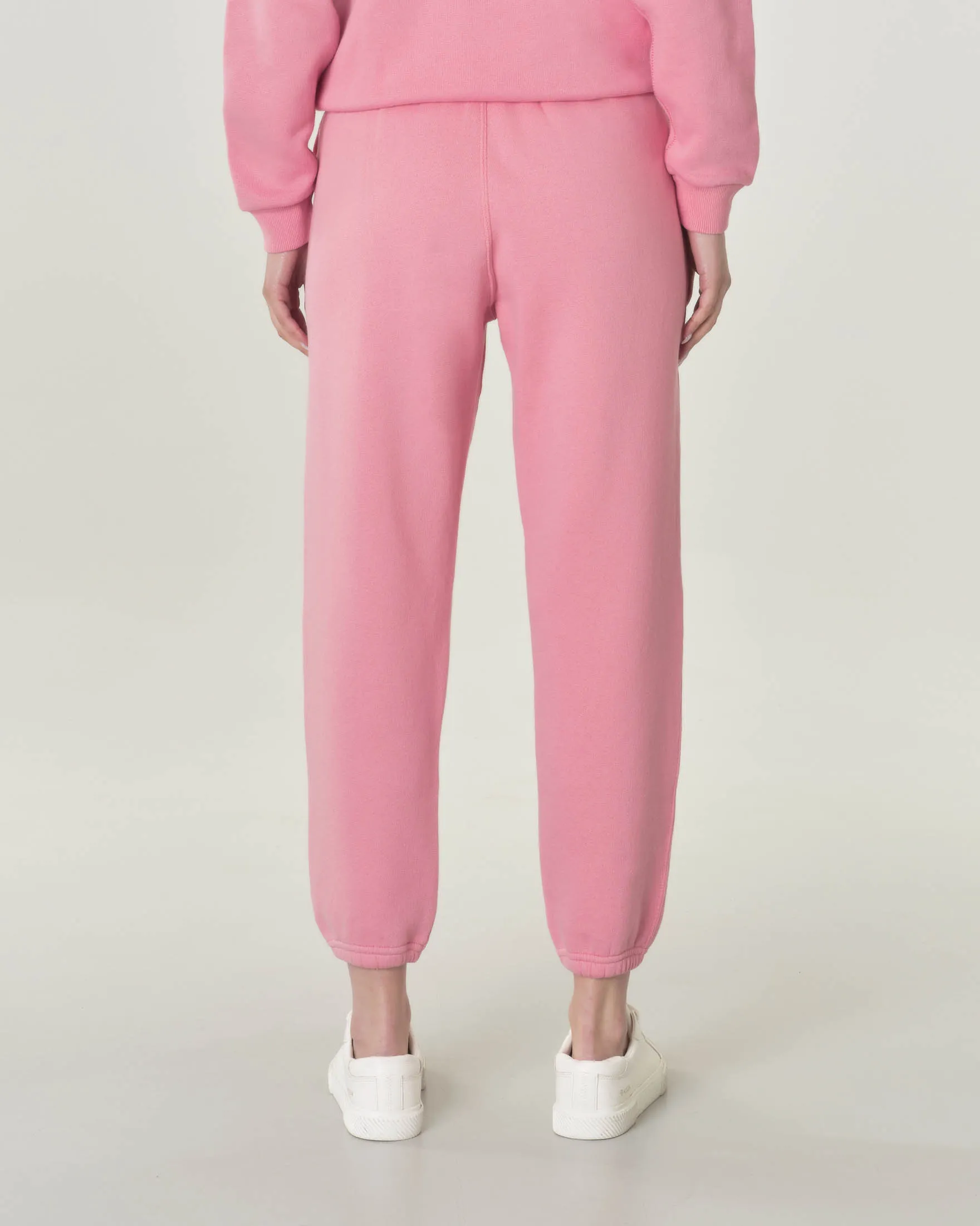 Pantaloni rosa in felpa di cotone con elastico inserito nei polsini e in vita