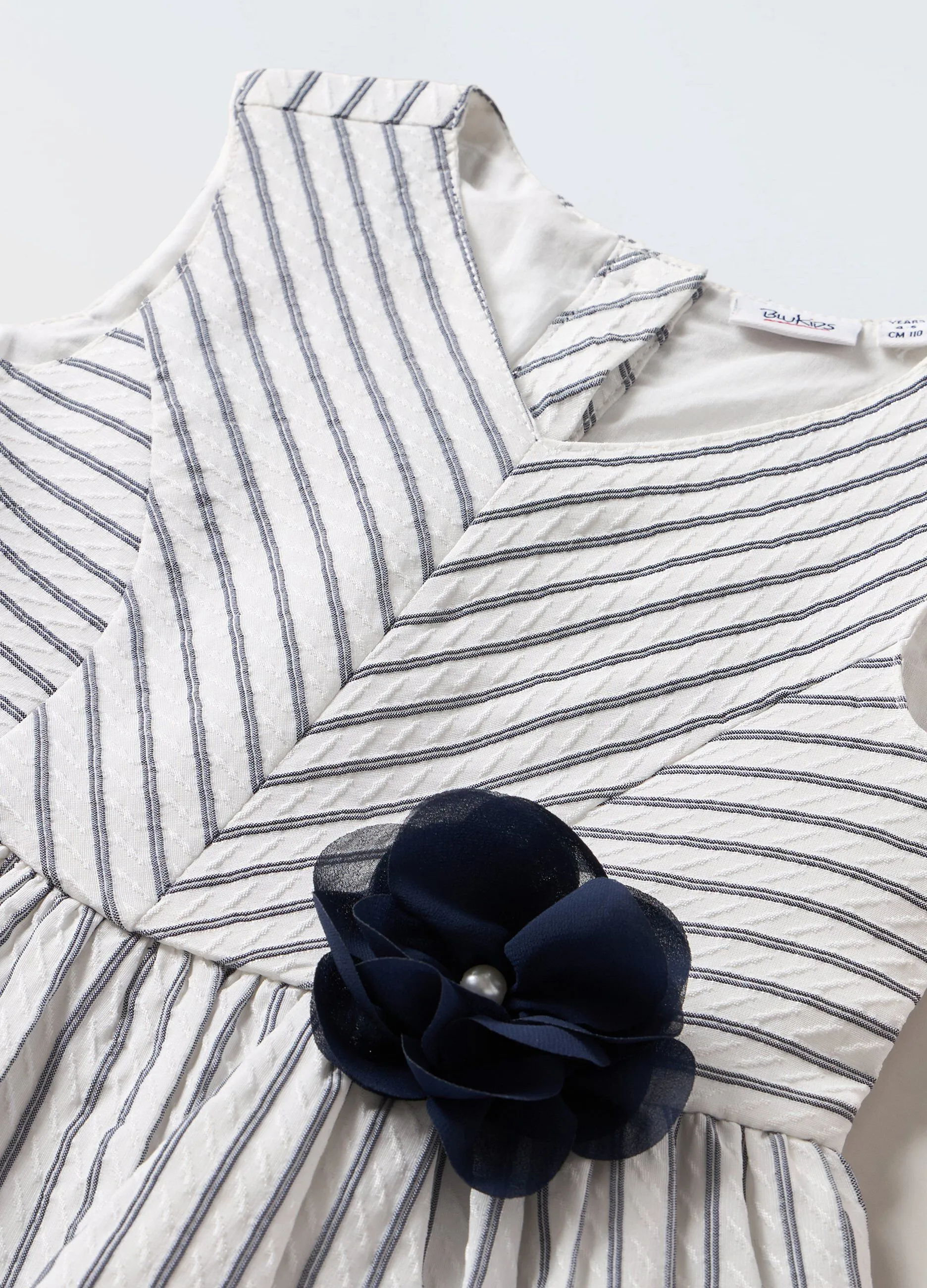 Vestito smanicato a righe bambina
